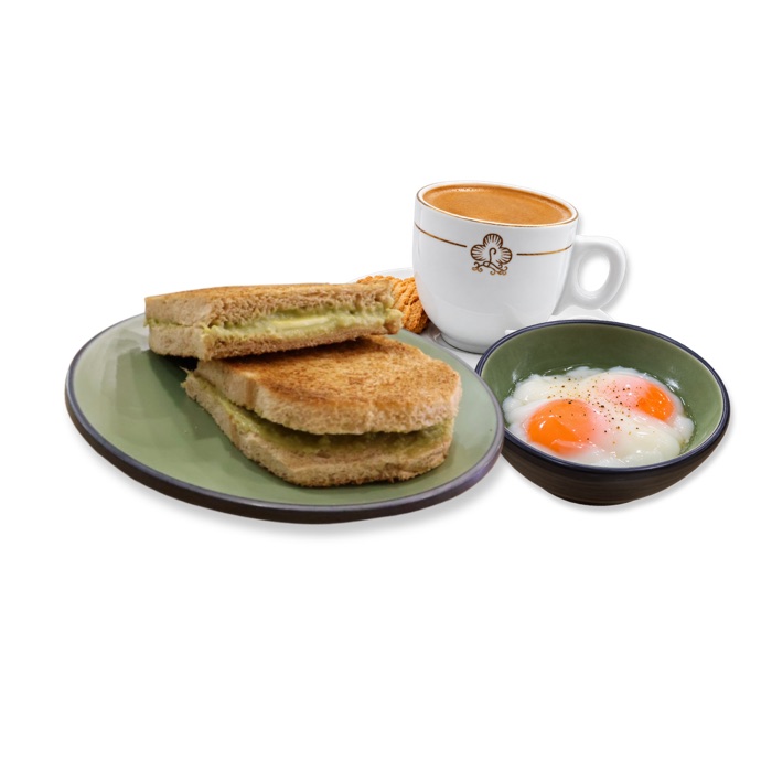 Kaya butter toast with two soft boiled eggs and a hot kopi