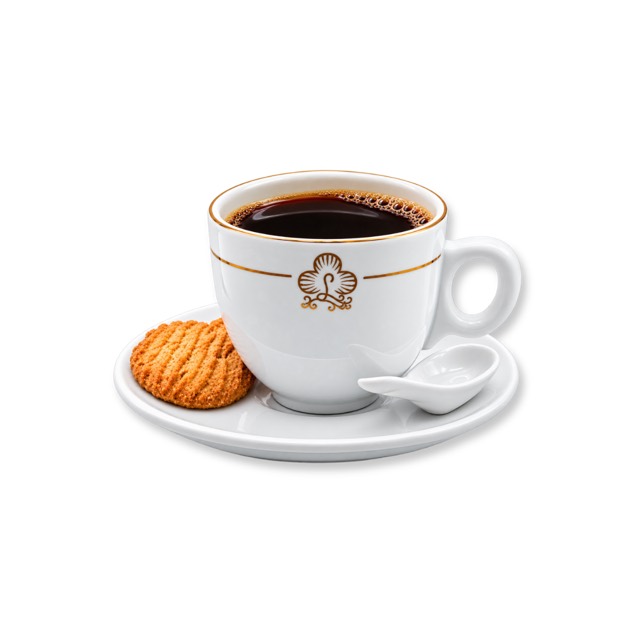 A hot kopi 'O' in a traditional Cafe cup and saucer